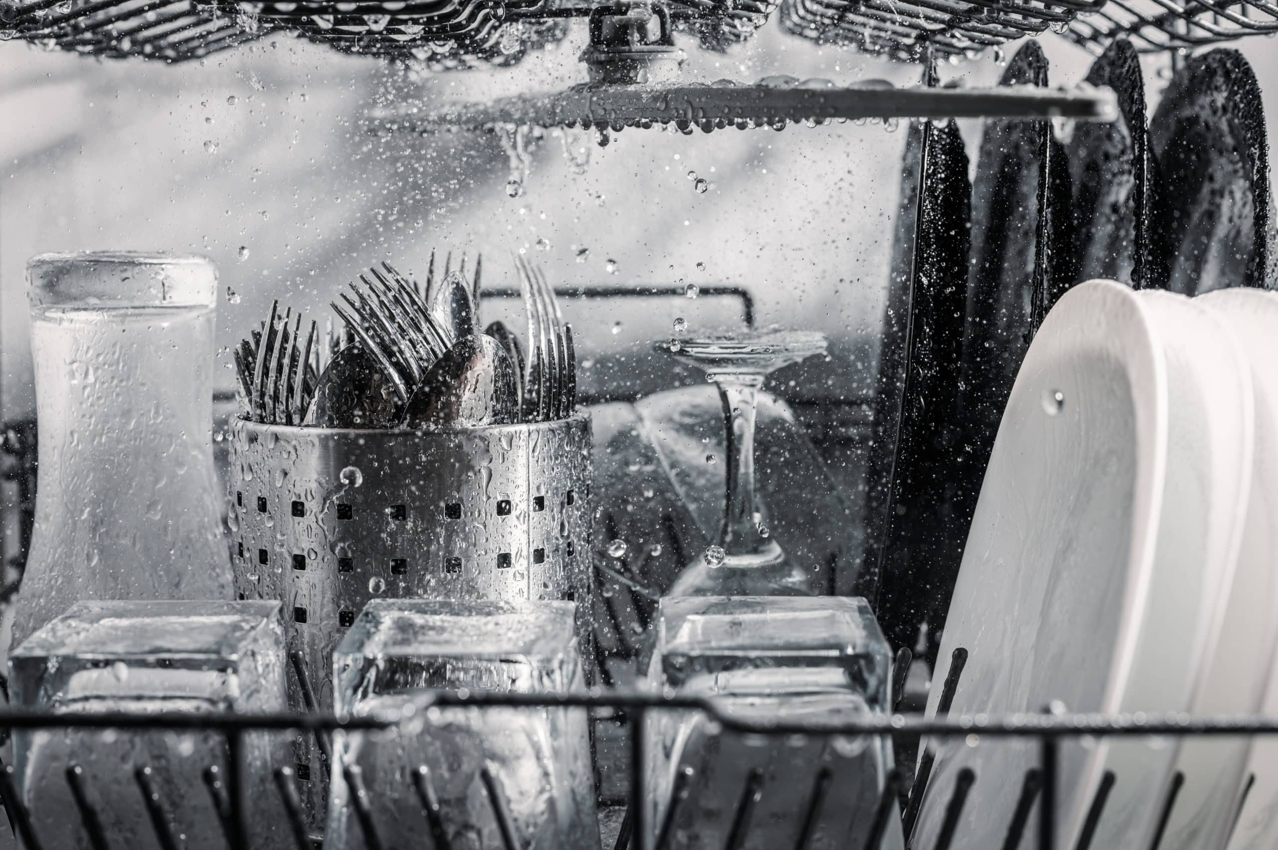 dishes being washed in a dishwasher
