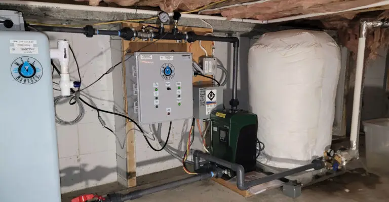 Low Horizontal Well Manager 2 tank system in a crawl space